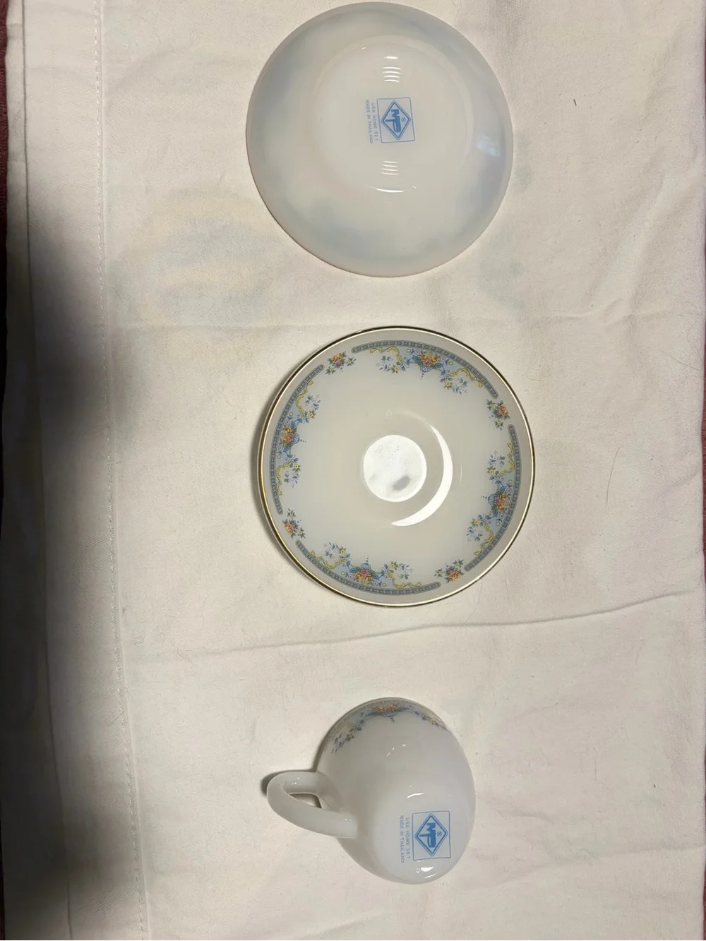 Porcelain Teacup and Saucer Set in White with Blue Floral Trim